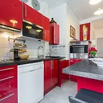 Stylish White And Red Apartment